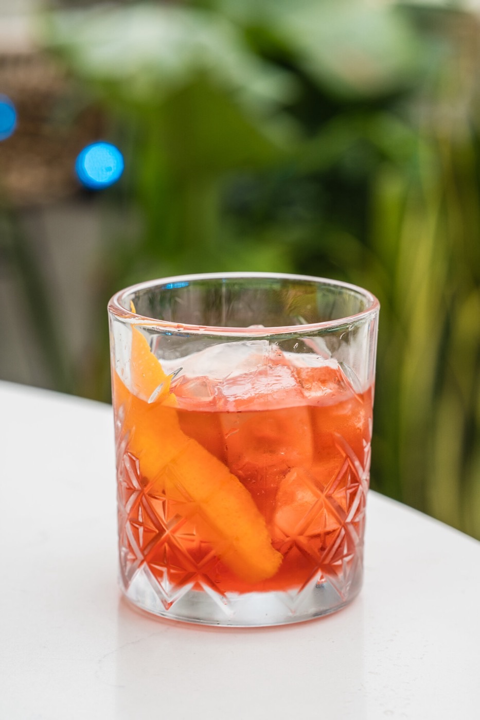 Rooftop patio and glass atrium bar at Coco Maya Little Italy San Diego