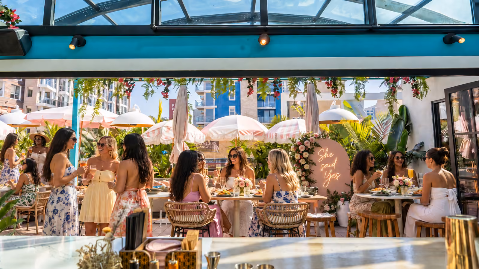 Bachelorette party guests celebrating on the Coco Maya patio in Little Italy San Diego