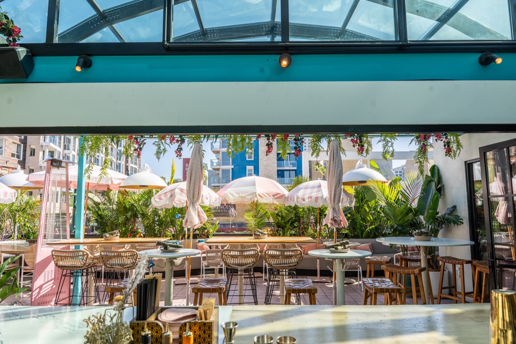Coco Maya bar looking out to the elevated patio in Little Italy